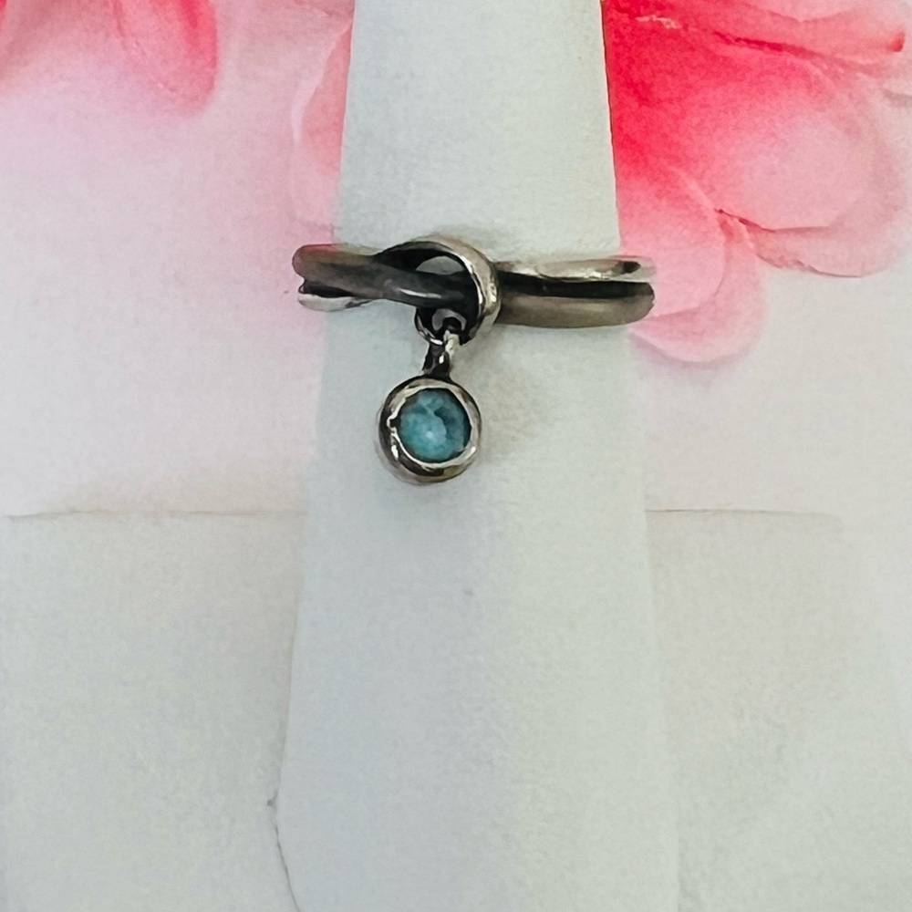 Silver .925 ring size 5.5 with blue topaz Charm
